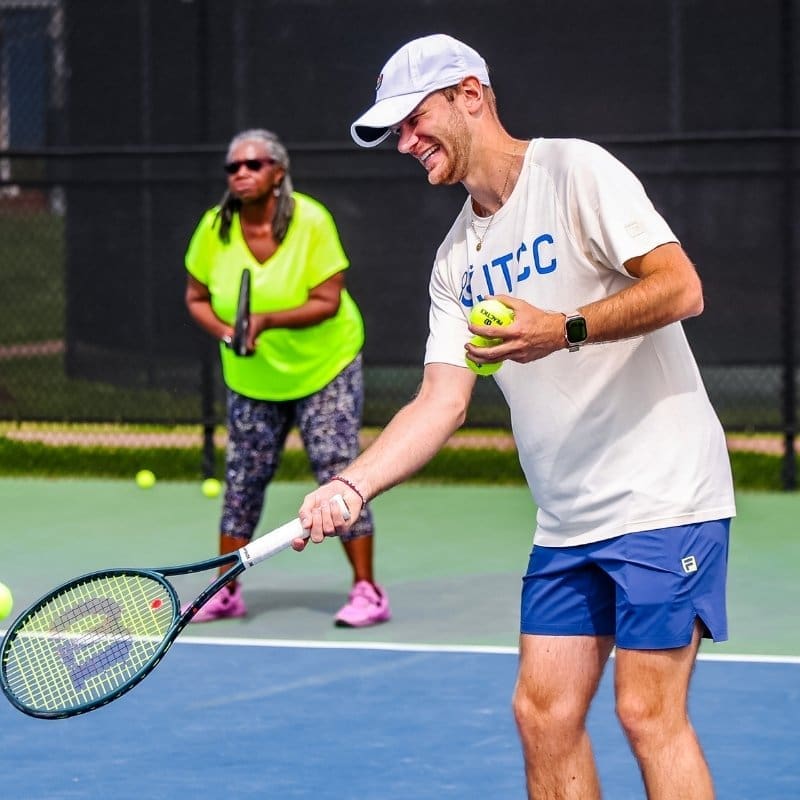 JTCC Tennis Coach Doing Drills