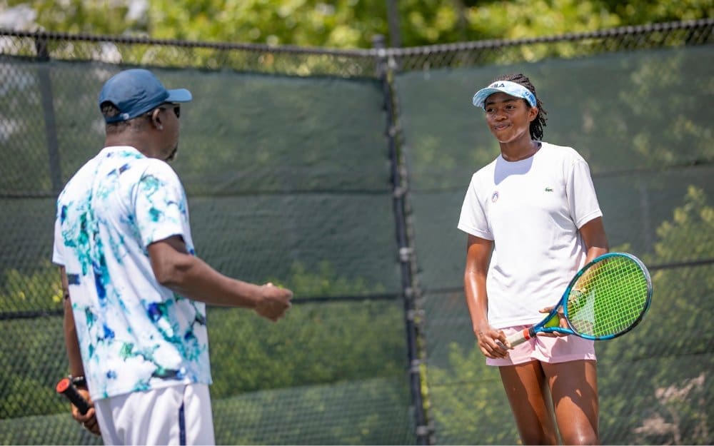 JTCC Coach Giving Private Lesson to a Junior Player