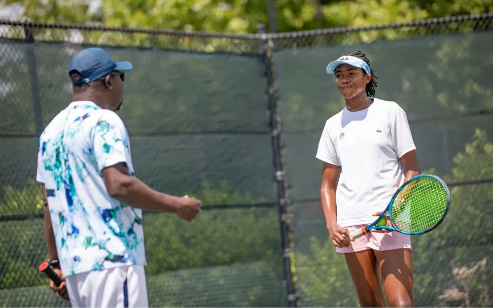 JTCC Coach Giving Private Lesson to a Junior Player